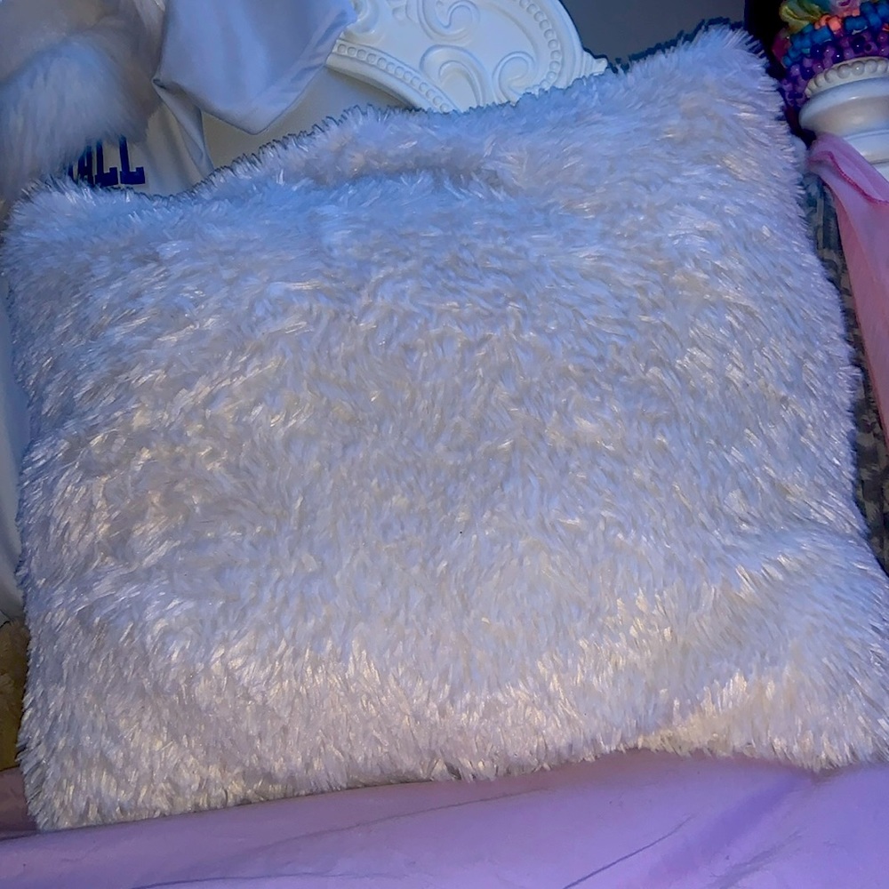 A white fluffy pillow